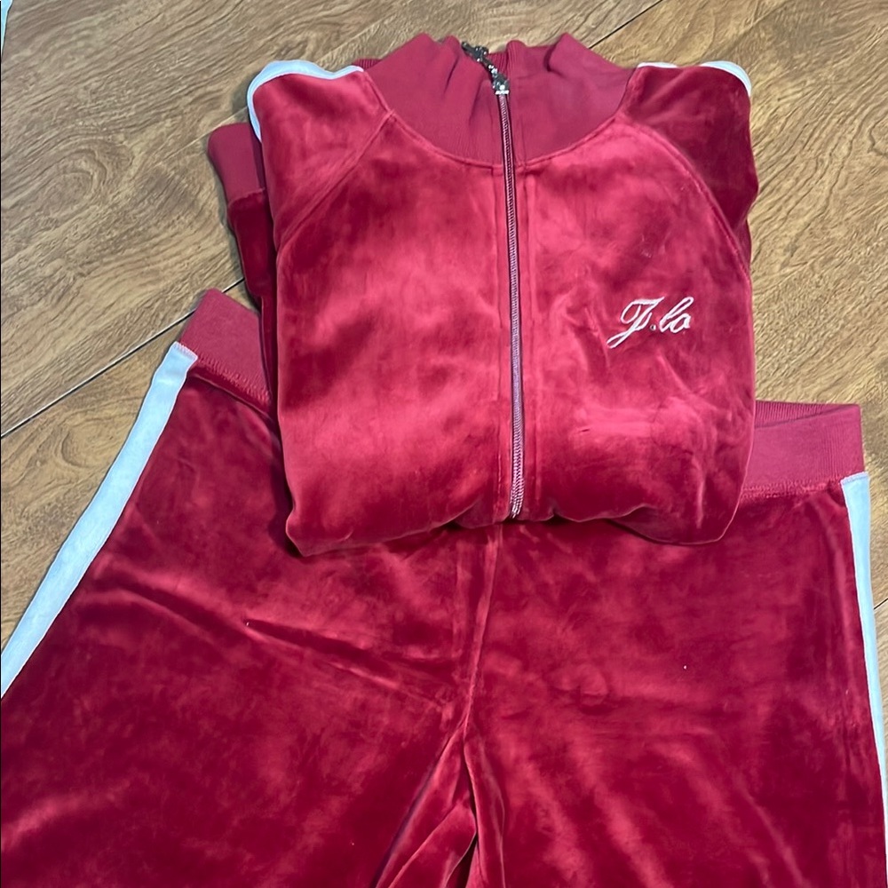 Jennifer Lopez Red Track Pants with White Stripes